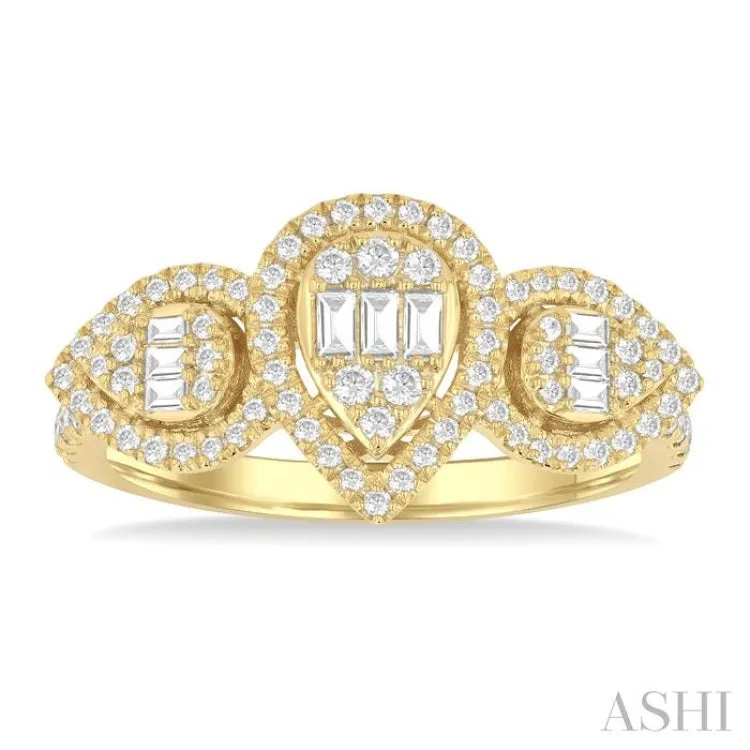 5/8 Ctw Pear Shape Past, Present & Future Fusion Baguette and Round Cut Diamond Halo Engagement Ring in 14K Yellow Gold