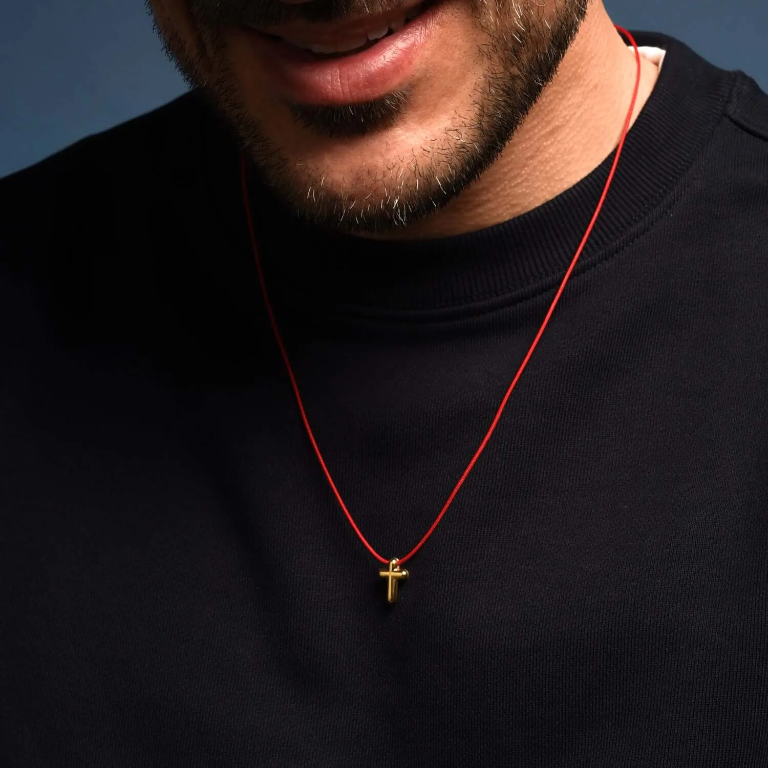 CROSS NECKLACE - RED ROPE AND GOLDEN SILVER