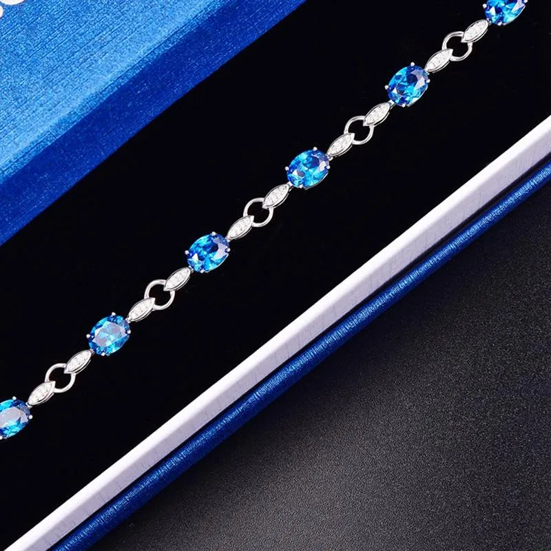 Ocean Blue Oval Topaz 925 Silver Bangle