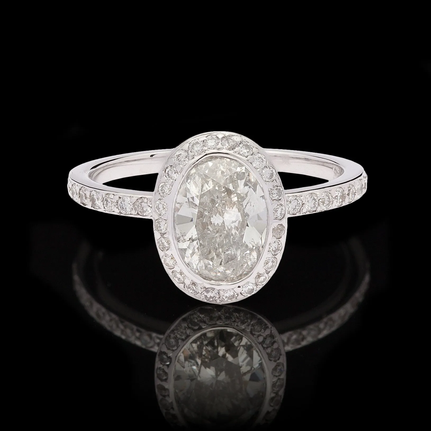 Oval Diamond 18Kt Halo Ring